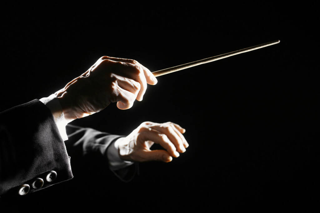 orchestra-conductor-hands-baton-music-director-holding-stick.jpg