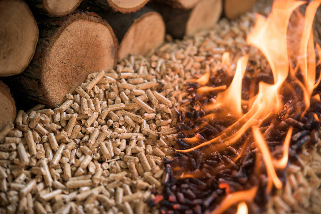 Pile Of Burning Beech Pellets And Wood - Heating